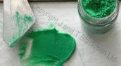 mixed wax and green  pigment